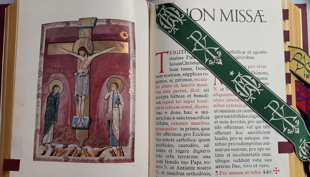 repaired 1962 altar Missal open at Canon of the Mass