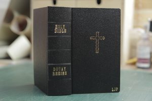 Douay Rheims Bible with new black cover, gold letters and gold cross