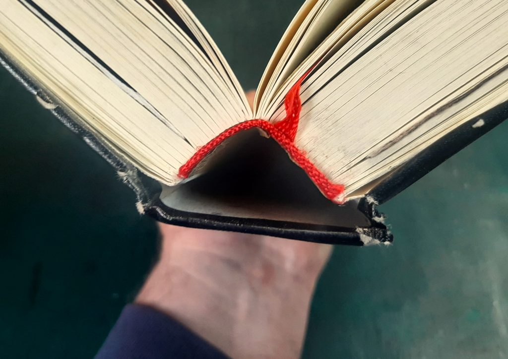 Open hardback book to show the Oxford hollow
