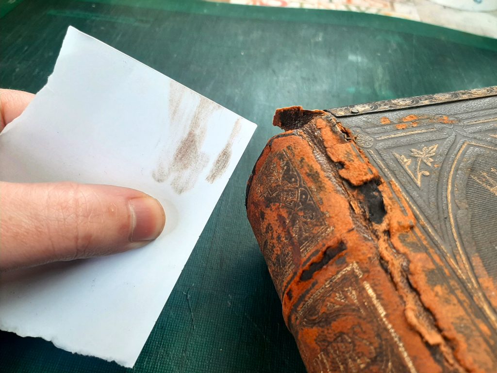 Red Rot on the cover and spine of a Victorian leather book
