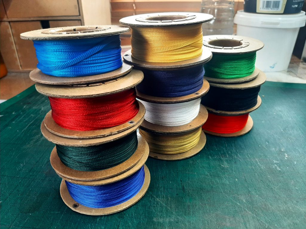 11 reels of woven book mark ribbons