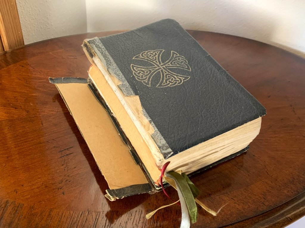 Liturgy of the Hours with split hinge and loose spine and frayed ribbons